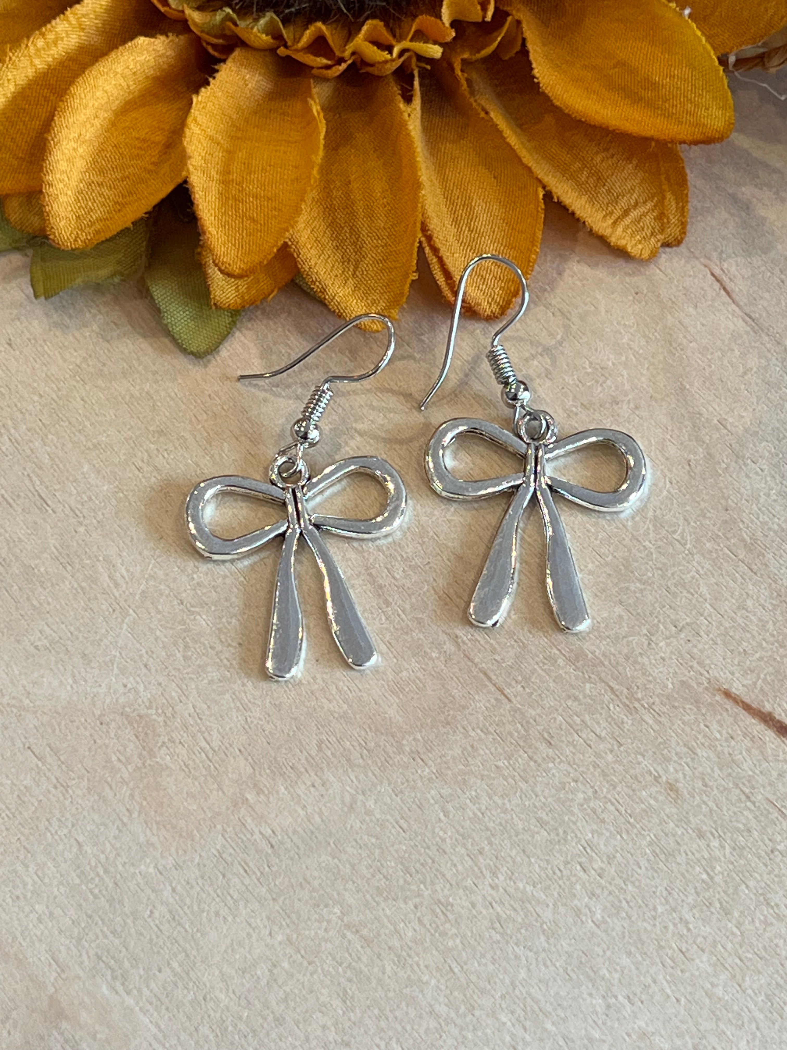 Silver Bow Copper Earrings