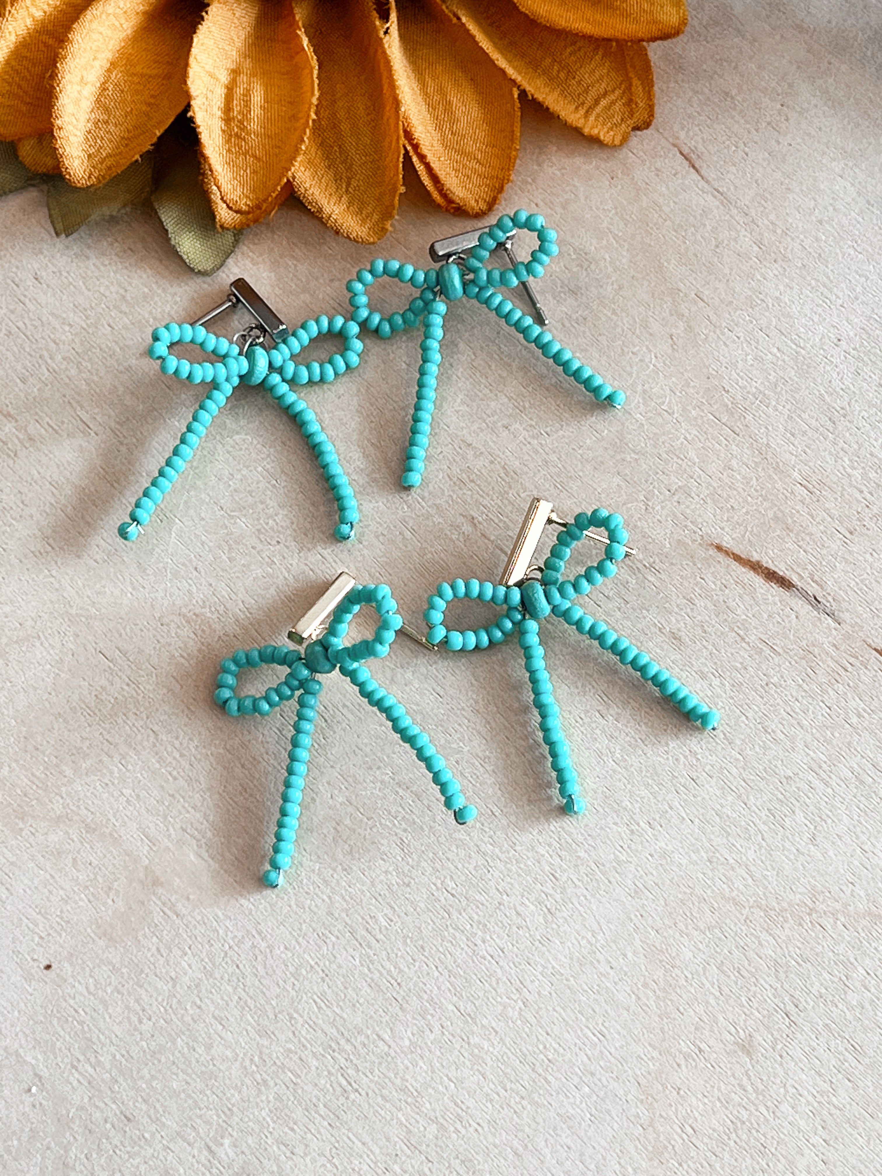 Turquoise Bow Handbeaded Earrings